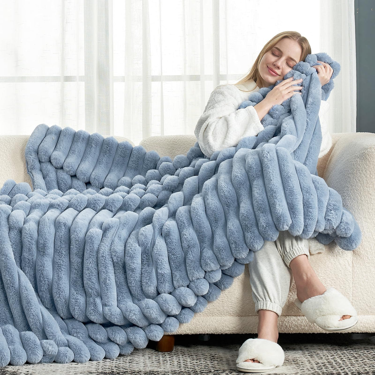 Close-up texture of Cozy Bliss faux fur blanket showing softness