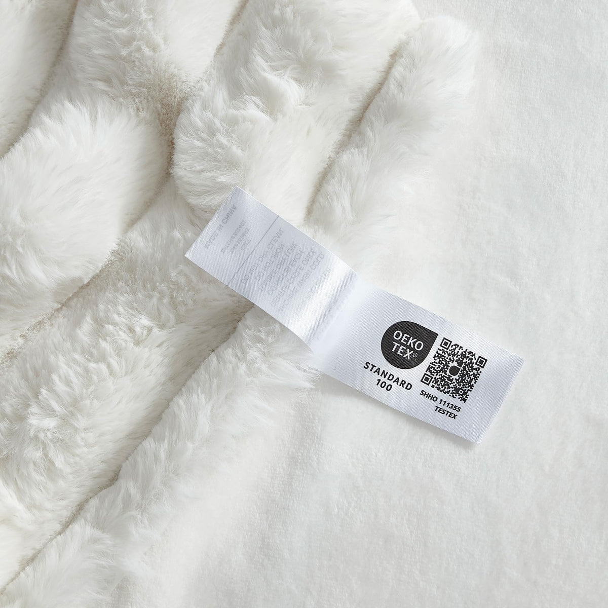 Cream white Cozy Bliss throw blanket brightens living room