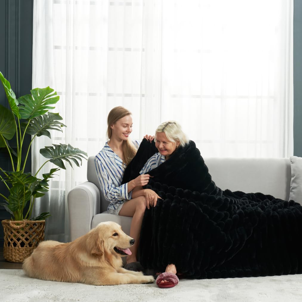 Cozy Bliss throw blanket folded to reveal lightweight, easy-care design.