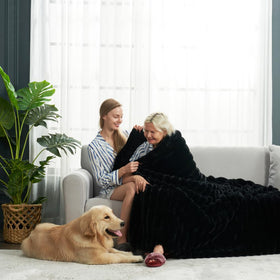 Cozy Bliss throw blanket folded to reveal lightweight, easy-care design.