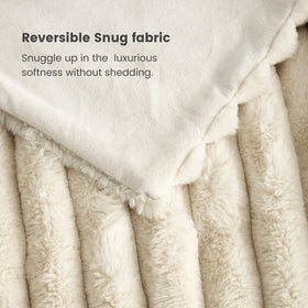 Cozy Bliss Faux Fur Throw Blanket lightweight design for easy lounging.