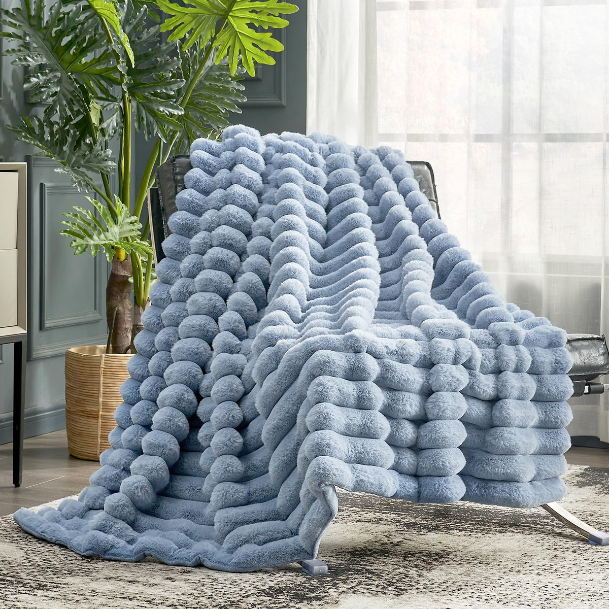 Cozy Bliss faux fur throw blanket on couch for plush warmth