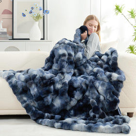 Cozy Bliss faux fur throw bubble shape adds couch warmth and softness.