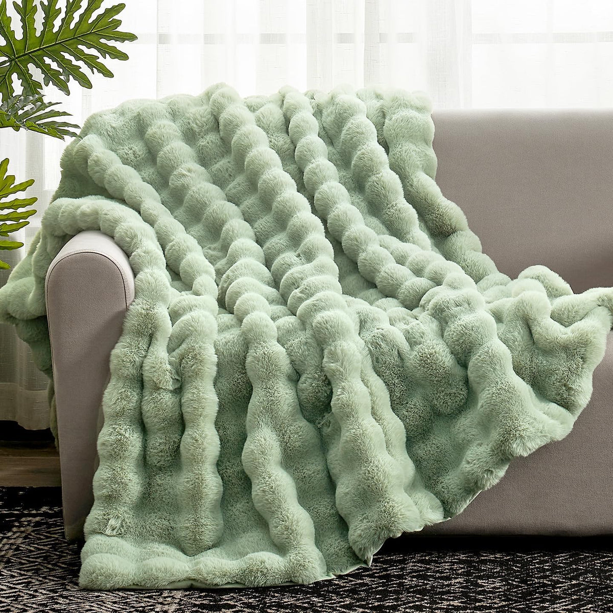 Cozy Bliss faux fur throw with bubble shape for plush warmth and style.