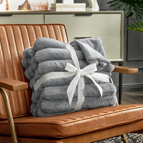 Cozy Bliss faux fur throw folded for easy portability.