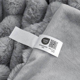 Cozy Bliss faux fur throw in gift-ready packaging.