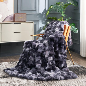 Cozy Bliss faux fur throw on sofa adds warmth and a luxe look