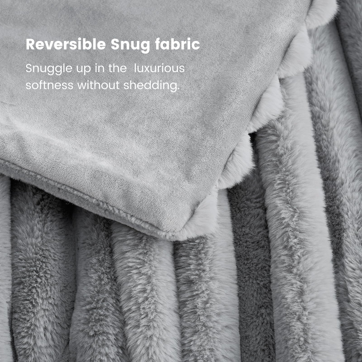Cozy Bliss faux fur throw adds texture and comfort to living room.