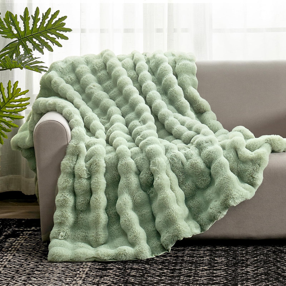 Cozy Bliss-faux-fur-throw-sage-green full-view enhances living room style and comfort.