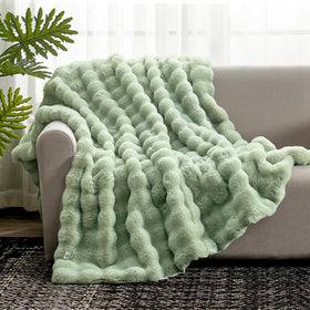 Cozy Bliss-faux-fur-throw-sage-green full-view enhances living room style and comfort.