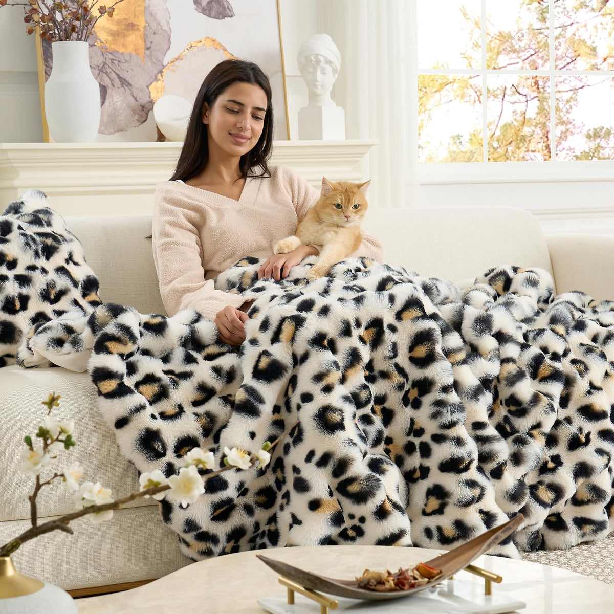 Cozy Bliss leopard bubble throw features faux rabbit fur face for ultra-soft snuggling.