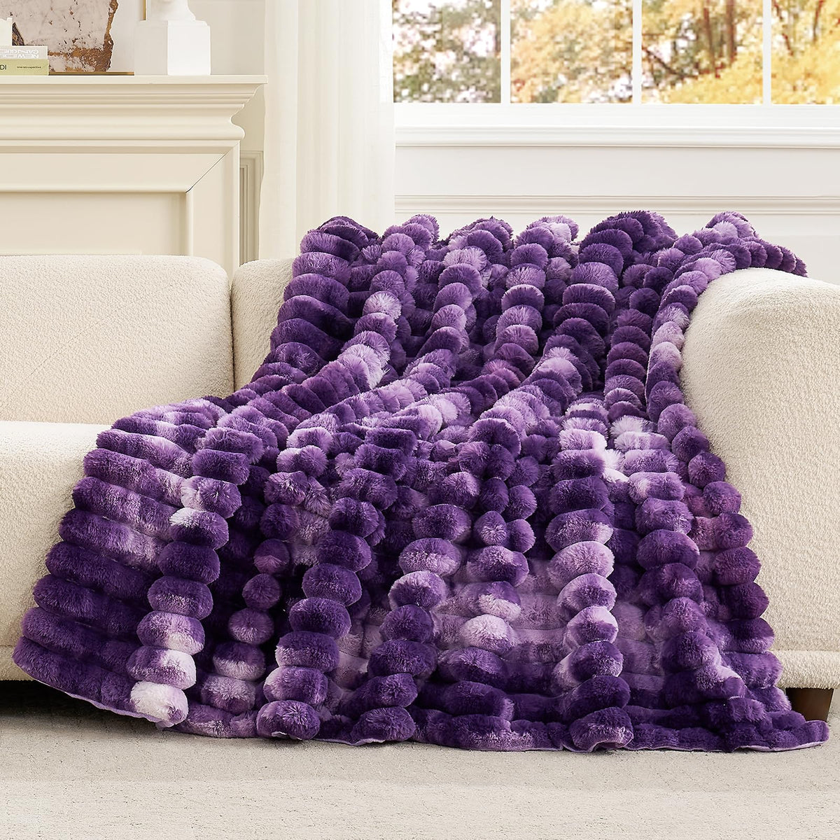 Cozy Bliss folded blanket displayed neatly for easy access.