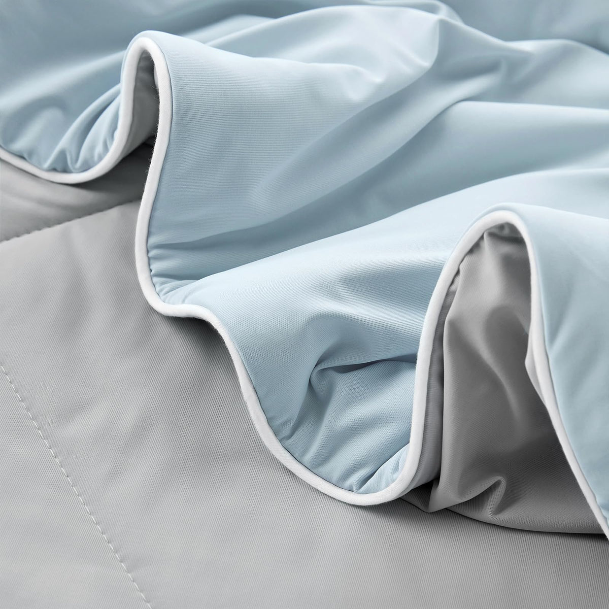 Cozy Bliss full-queen size blanket neatly spread on bed.