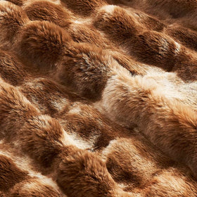 Cozy Bliss gift-ready blanket brings warmth for loved ones during winter.