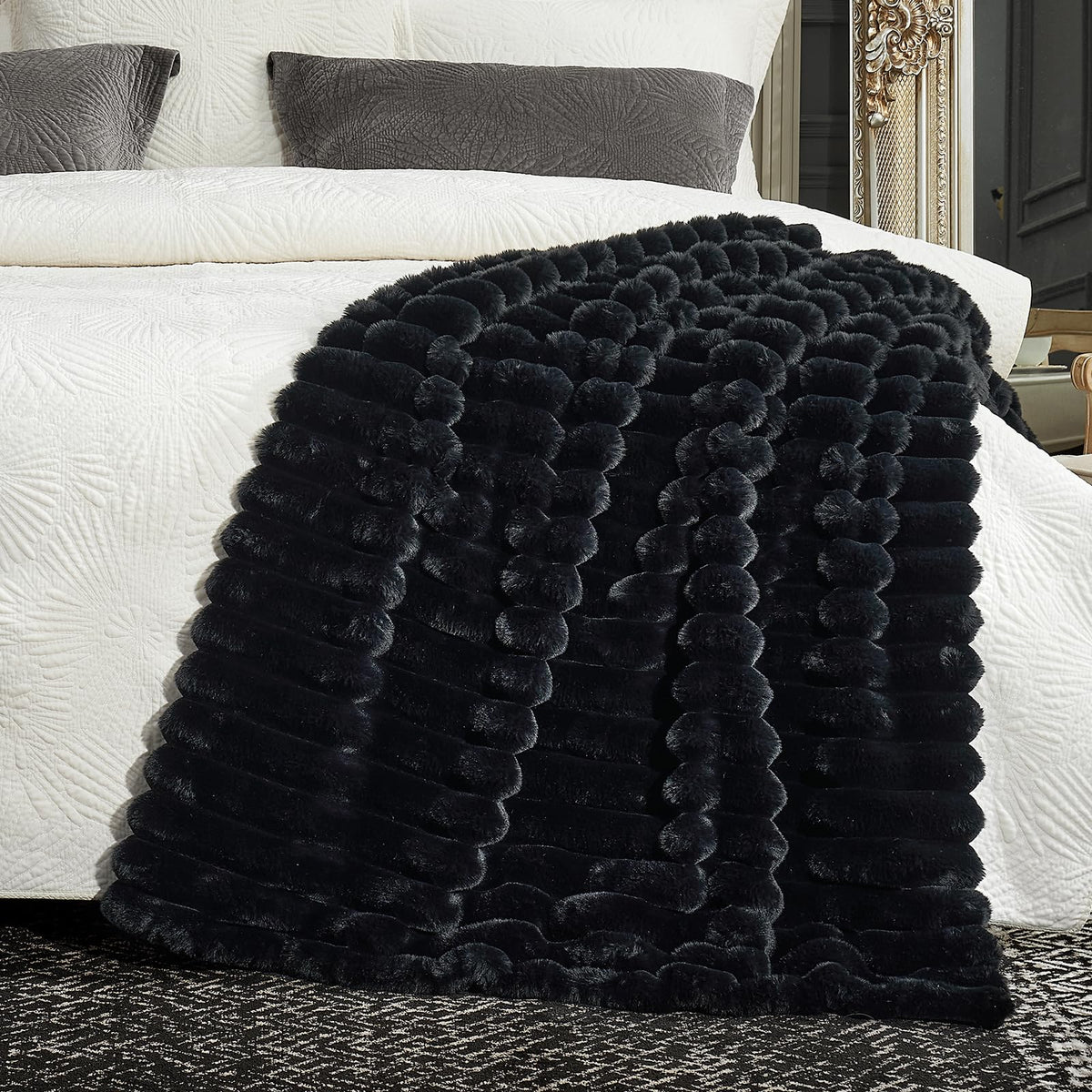 Cozy Bliss lightweight blanket draped for warm, versatile comfort.