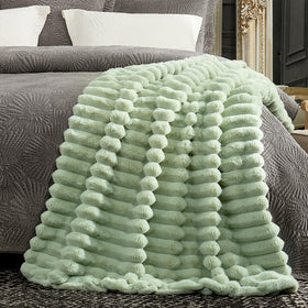 Machine-washable Cozy Bliss faux fur blanket for easy care