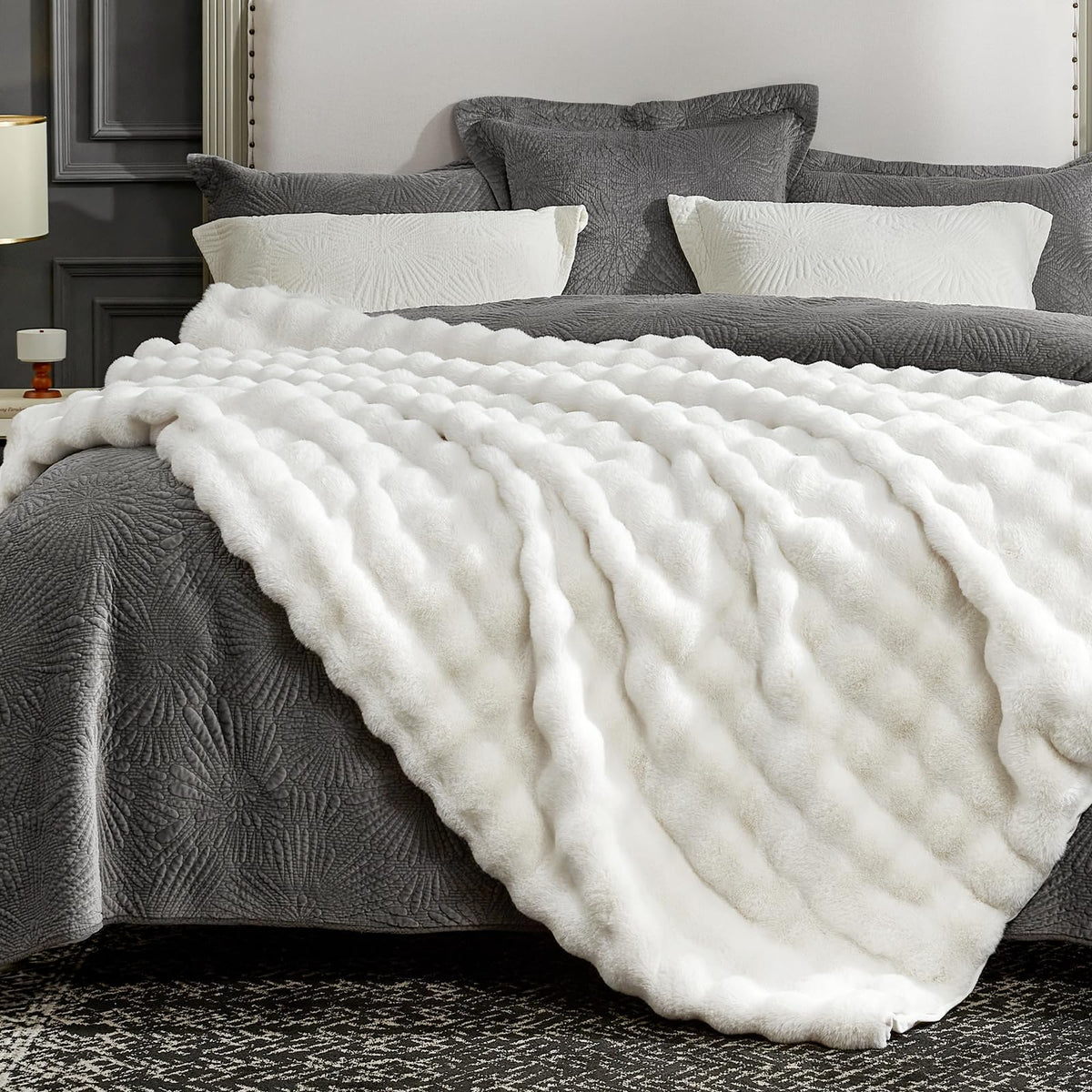 Cozy Bliss plush soft fabric blanket for all-season comfort and vibes.