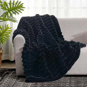 Cozy Bliss plush striped blanket closeup highlights soft texture.