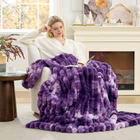 Cozy Bliss plush throw blanket in the bedroom creates soft, cocoon-like comfort.