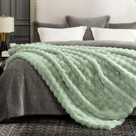 Cozy Bliss rabbit fur face side offers ultra soft touch for chilly evenings.