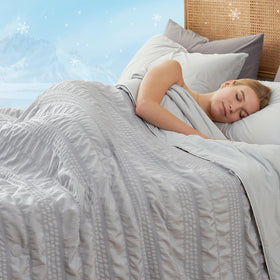 Cozy Bliss Seersucker Cooling Comforter Queen reversible design close-up for year-round comfort