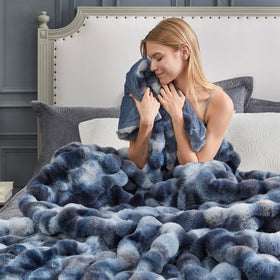 Cozy Bliss soft warmth draped over a sofa for relaxation