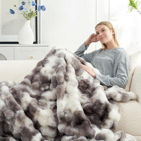 Cozy Bliss throw complements decor and provides gentle warmth.