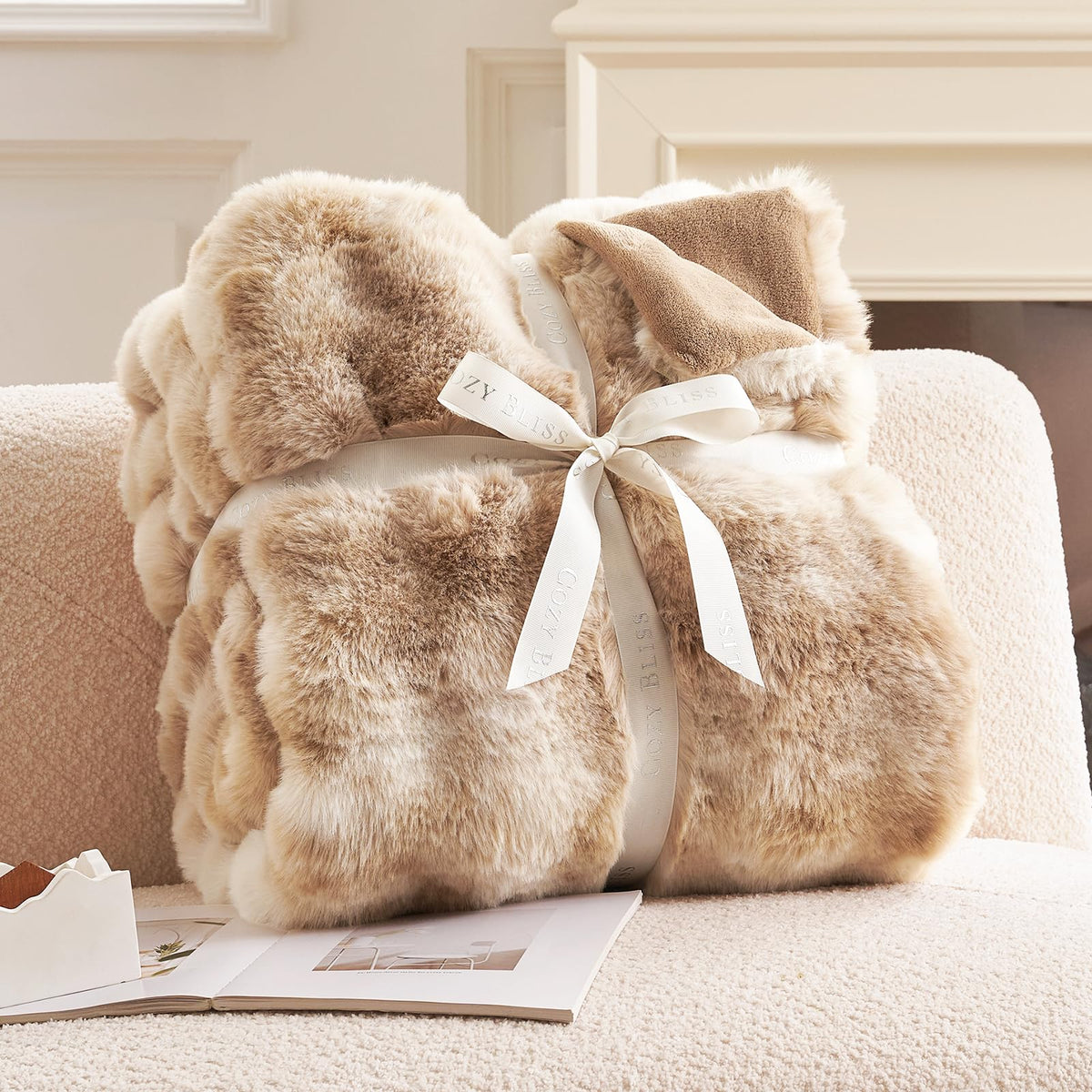 Cozy Bliss tie-dye beige throw draped as a stylish decor accent