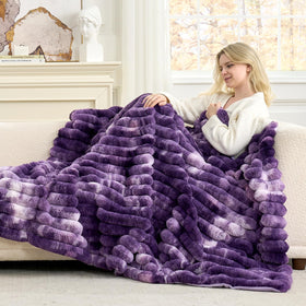 Cozy Bliss tie-dye purple blanket showcases color while providing plush warmth.