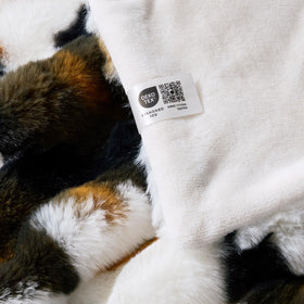 Cozy Bliss tri-color cow spots enhance warm farmhouse style.