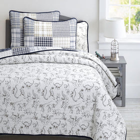 Benjamin dinosaur quilt is reversible for quick room updates and fresh looks.