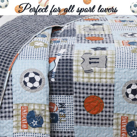 Cozy Line Blue Sports Quilt with soccer ball design enhances playroom decor