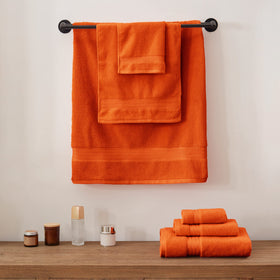 COZYART burnt orange care-instructions packaging image communicates easy maintenance