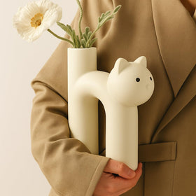 CozyKoala cat vase front view, neutral beige ceramic centerpiece for desks and shelves.