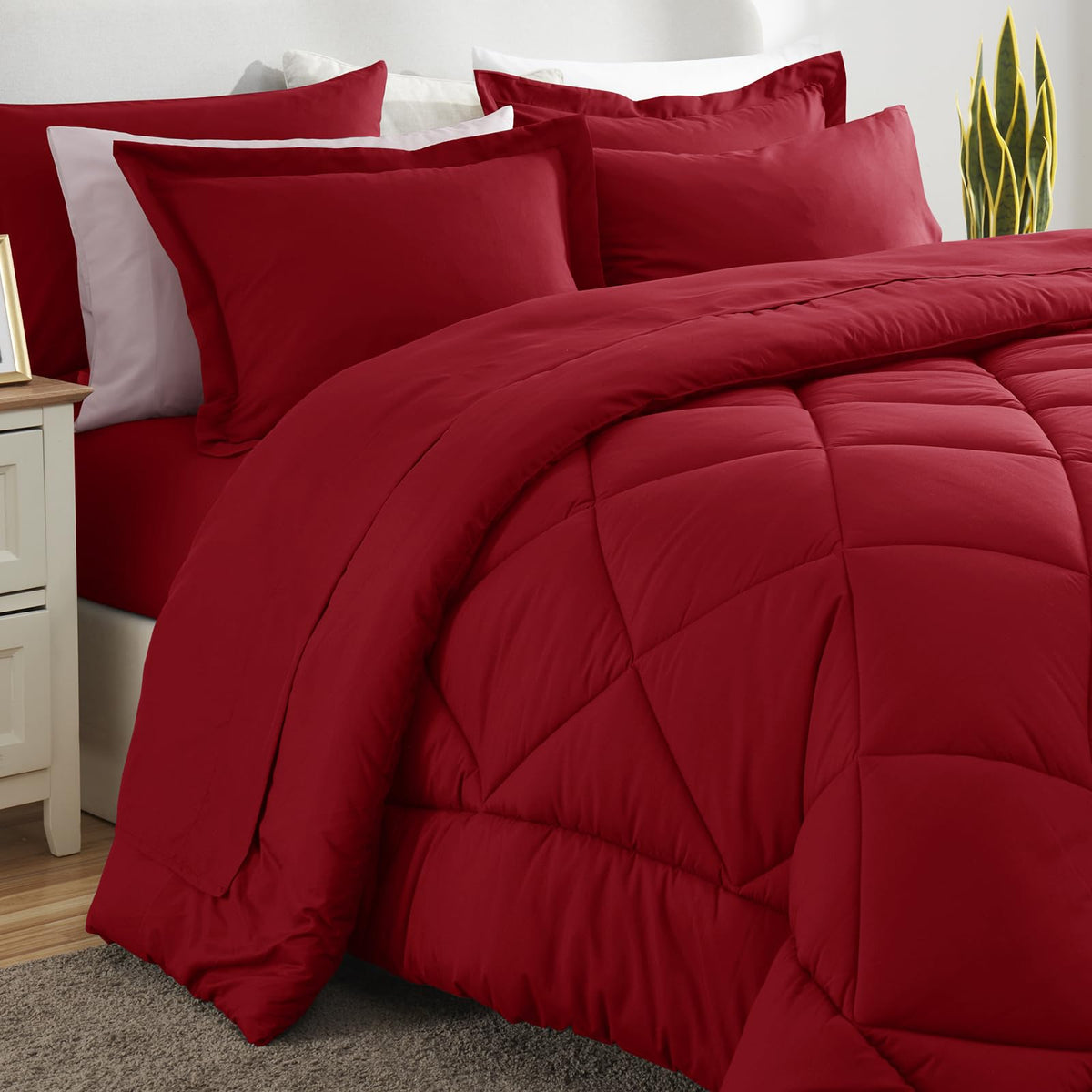 CozyLux seven-piece set covers bed with sheets, pillowcases, and matching shams.