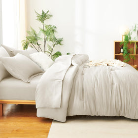 CozyLux beige seersucker bedding complements neutral decor for a calm, inviting bedroom.