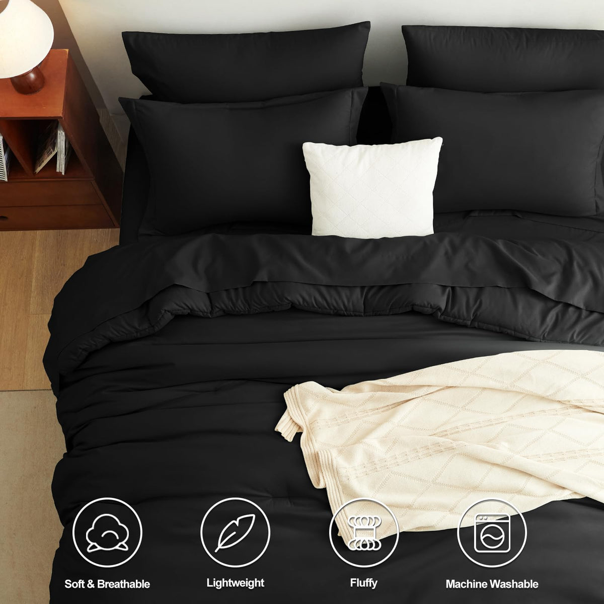 CozyLux black comforter close-up shows soft microfiber for cozy warmth