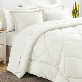 CozyLux deep-pocket fitted sheet on a king mattress, staying securely in place