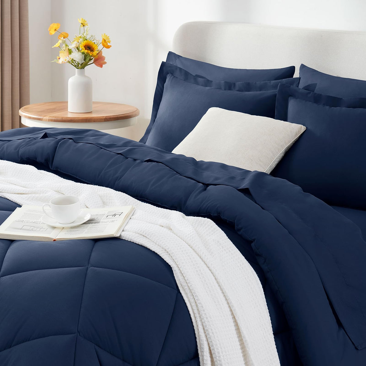 CozyLux navy blue comforter set styled on bed demonstrating all season versatility