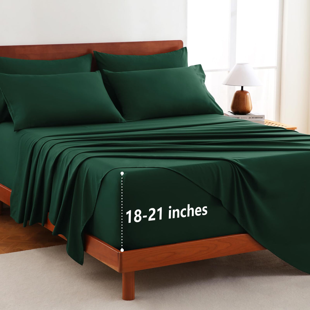 CozyLux emerald green King 6-piece sheets set folded, highlighting rich color and plush microfiber softness.