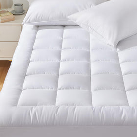 CozyLux full-size mattress pad with pillow-top in white, providing plush comfort and a smooth surface.