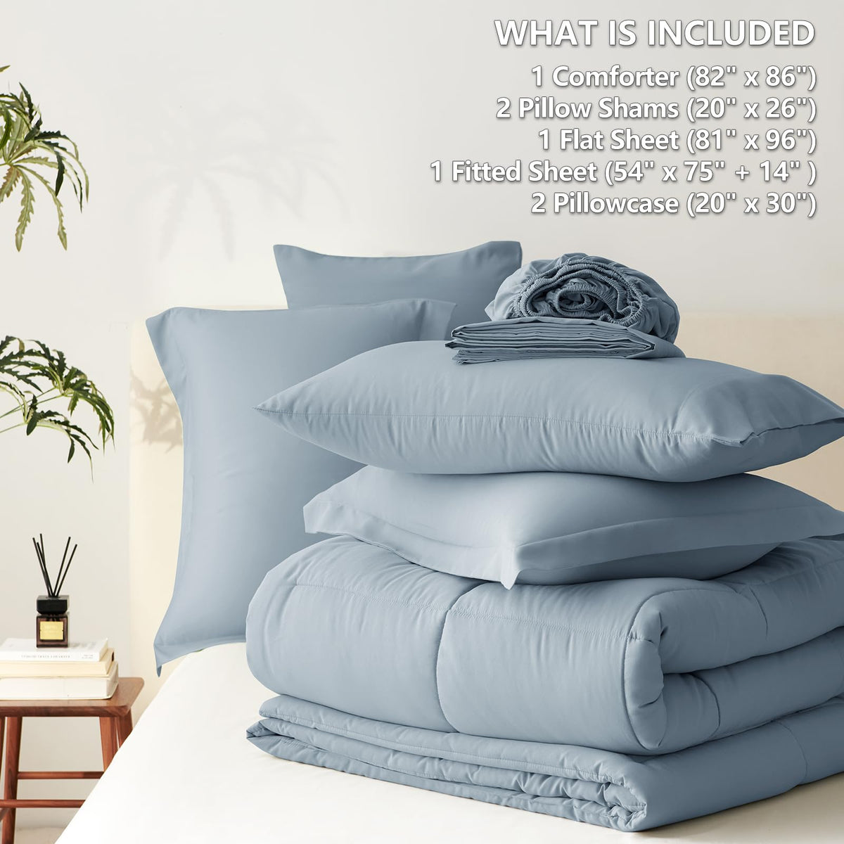 Pillow shams detail in grayish-blue matching set.