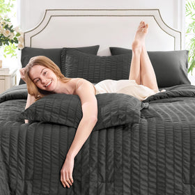 CozyLux king seersucker 7pc set pillows: smooth, easy-care pillowcases for comfort.