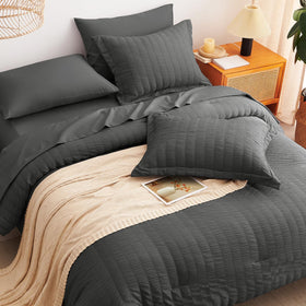 CozyLux king seersucker 7pc set vacuum-pack bag: compact packaging for easy storage.
