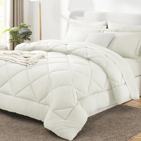 CozyLux king-size ivory comforter close-up showing plush softness and warmth