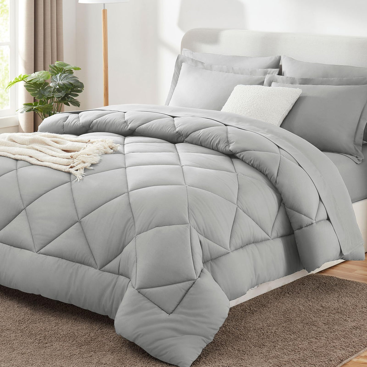 CozyLux king-size comforter set in light grey packaging for easy unboxing