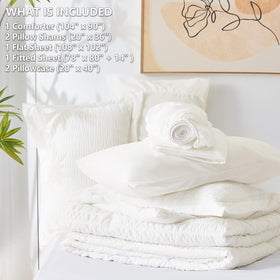 CozyLux microfiber comforter close-up shows soft warmth and durable stitching.
