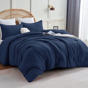 CozyLux navy blue king comforter close-up highlighting ultra-soft microfiber fabric