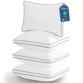 CozyLux queen pillow 4-pack close-up showing plush softness for luxurious sleep