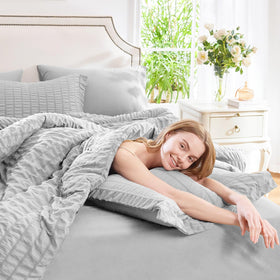 CozyLux pillow shams in soft grey complement the bedding